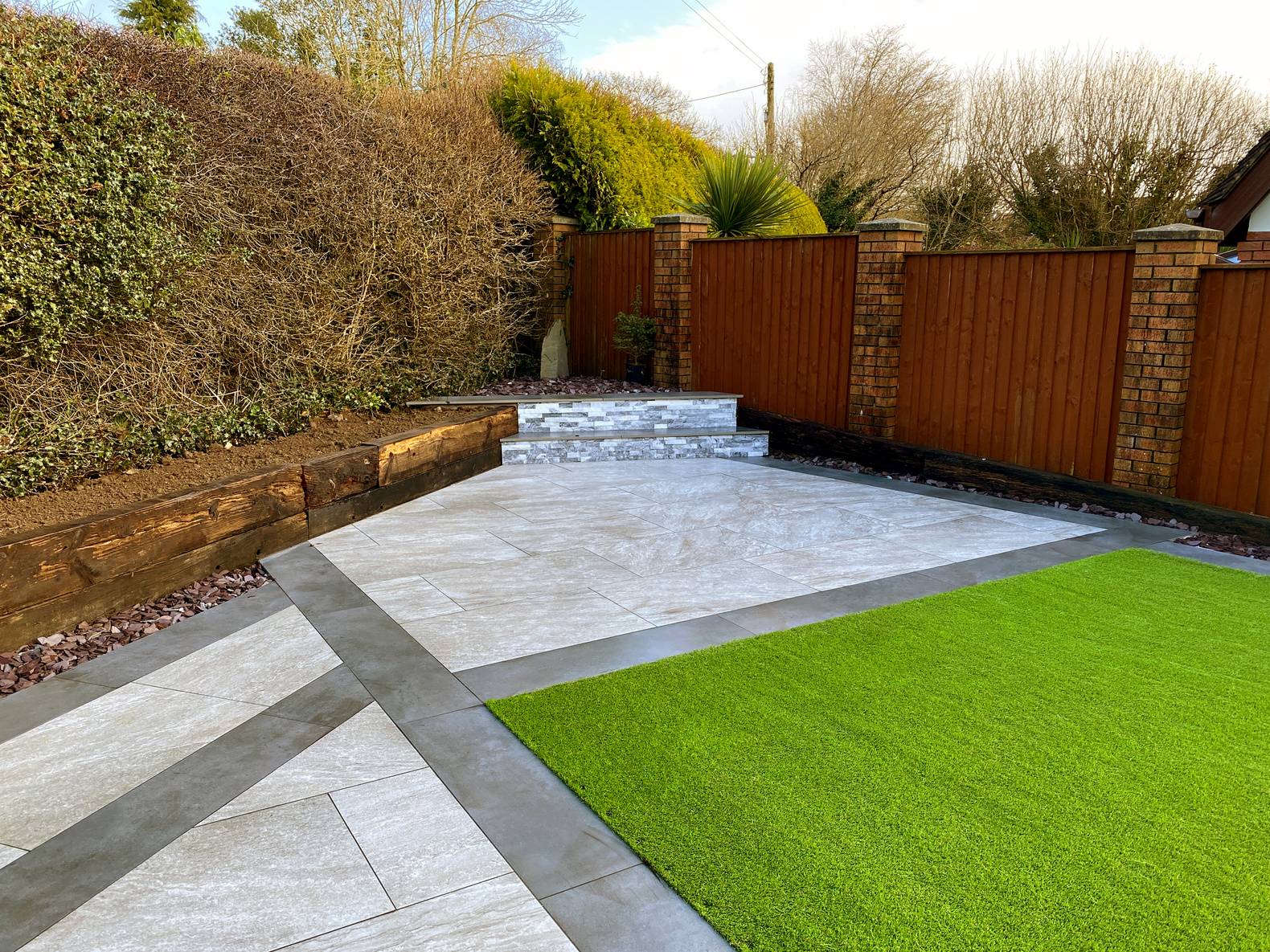 Landscaped garden with artificial lawn